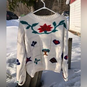 Cozy Cream Sweater with Floral and Heart Motifs